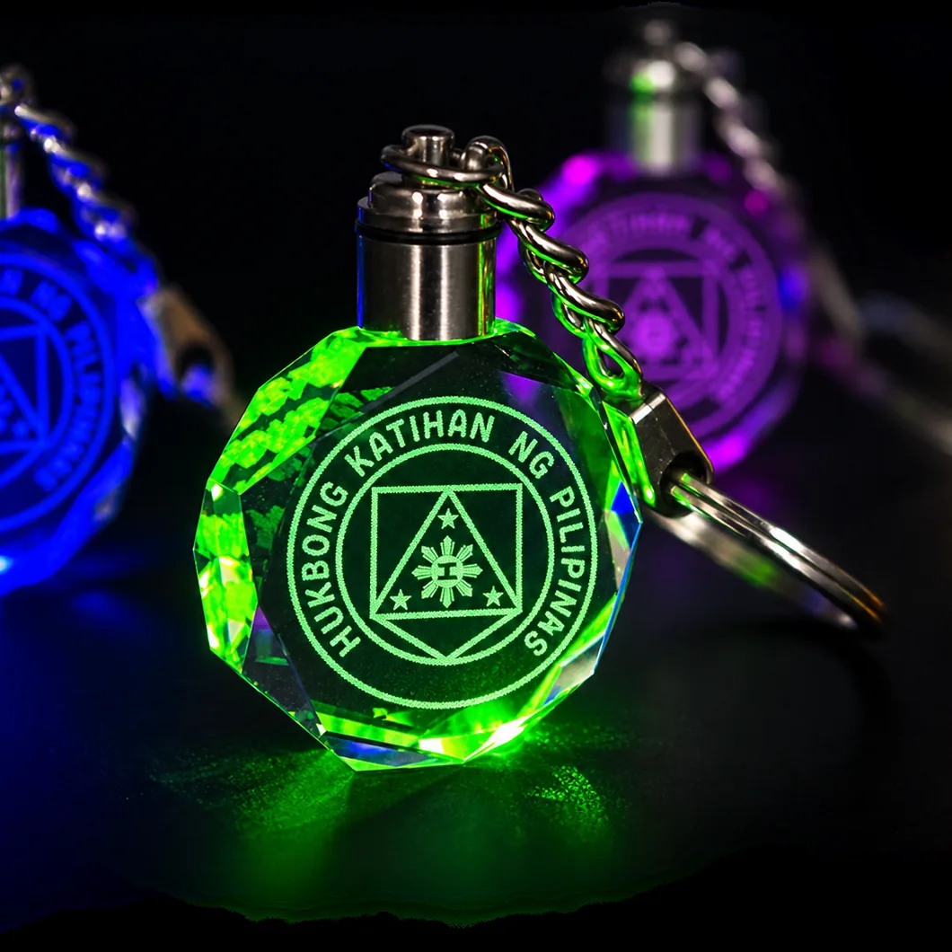 Crystal keychain etched with the Philippine Army seal, lit green