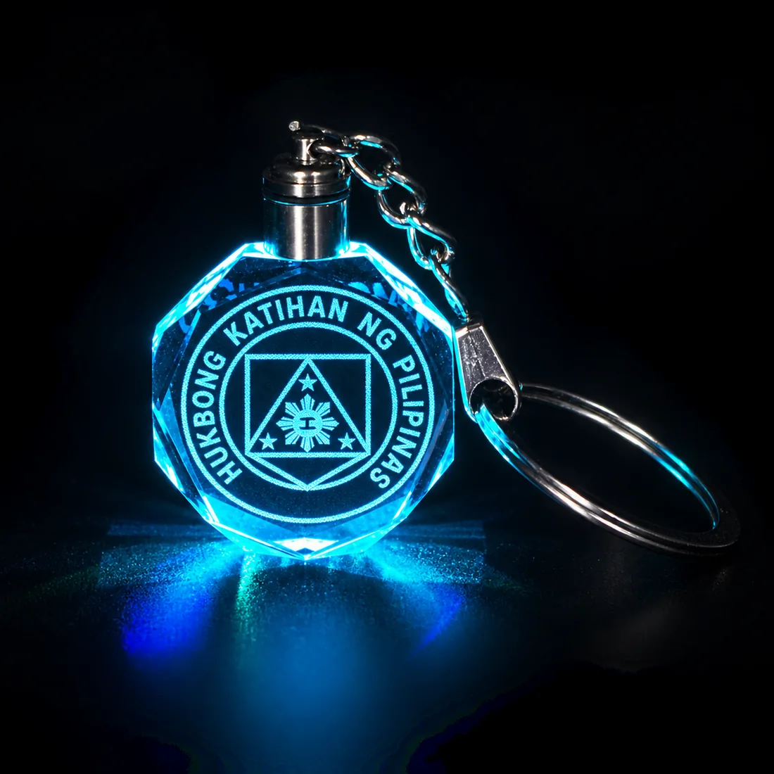Crystal keychain etched with the Philippine Army seal, lit ice blue