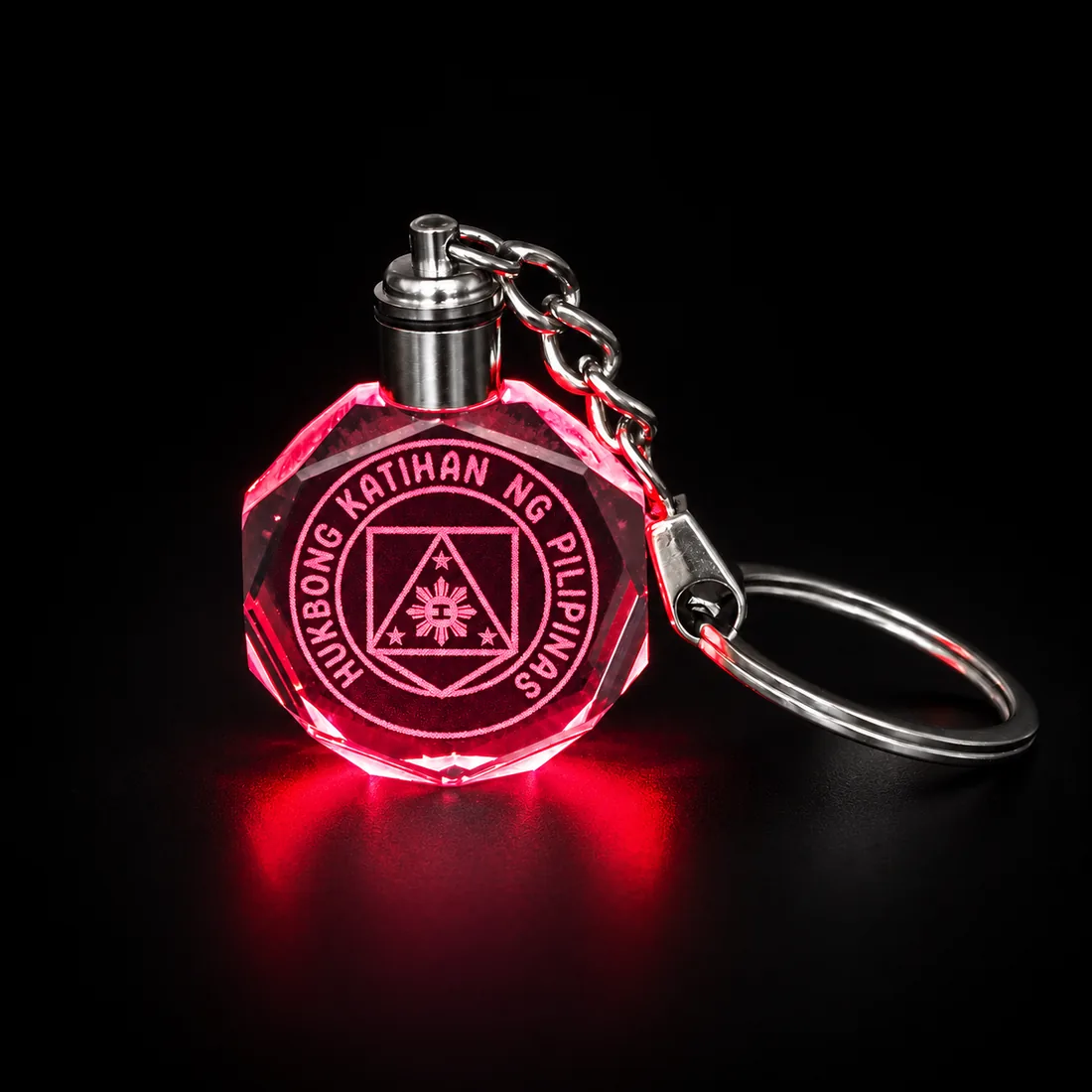 Crystal keychain etched with the Philippine Army seal, lit red